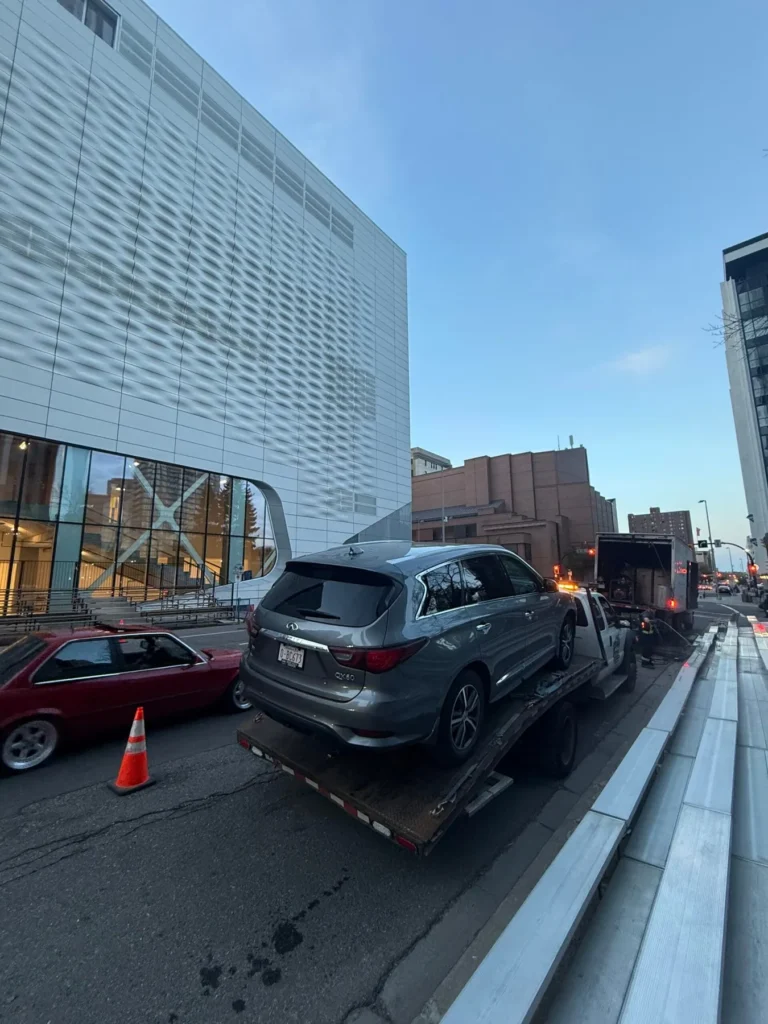 Jim Towing delivering an SUV to a Calgary dealership
